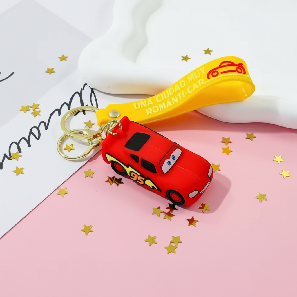 Lightning McQueen keychain lifestyle shot with gold star confetti on pink background