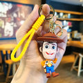 Woody 3D PVC keychain with yellow wristlet strap and gold-tone lobster clasp