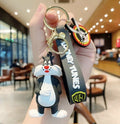 Sylvester the Cat from Looney Tunes 3D PVC keychain with dark grey Looney Tunes wristlet strap, WB shield charm and gold-tone lobster clasp