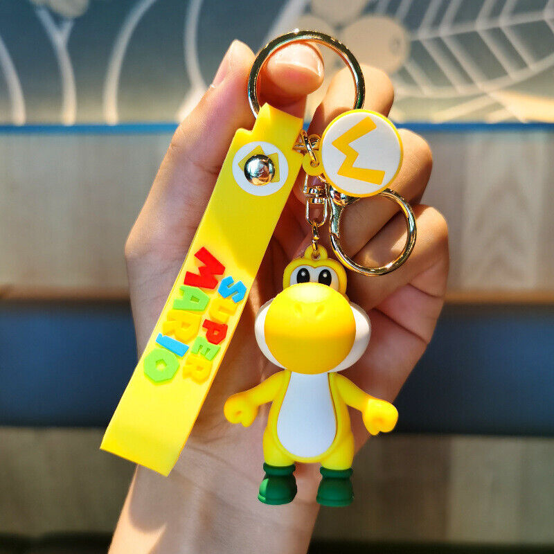 Yellow Yoshi Super Mario 3D PVC figure keychain with yellow Super Mario wrist strap