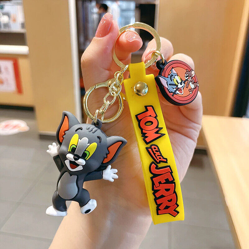 Tom Cat from Tom & Jerry running 3D rubber keychain with yellow Tom and Jerry wristlet strap and gold-tone lobster clasp