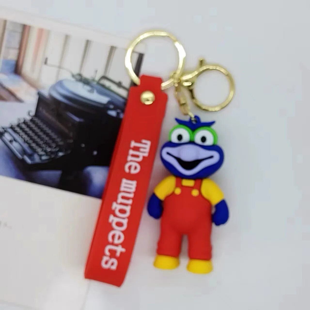 Gonzo from The Muppets 3D PVC keychain with red The Muppets wristlet strap and gold-tone lobster clasp