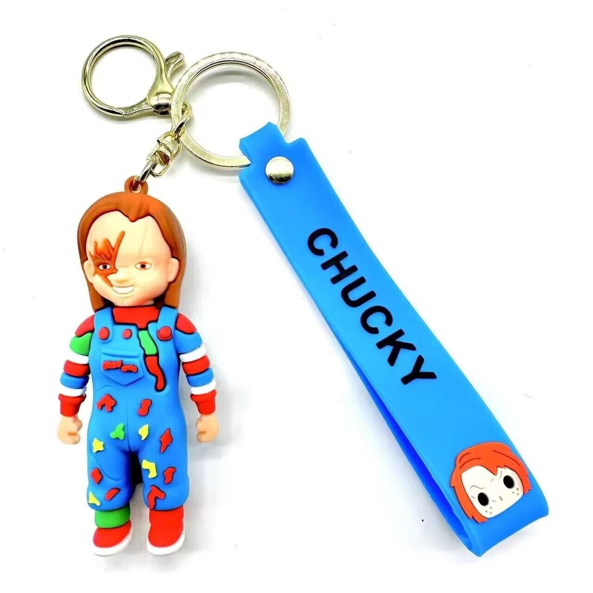 Chucky 3D PVC keychain in blue dungarees with blue Chucky branded wrist strap on white background