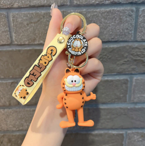 Garfield keychain with wrist strap held in hand
