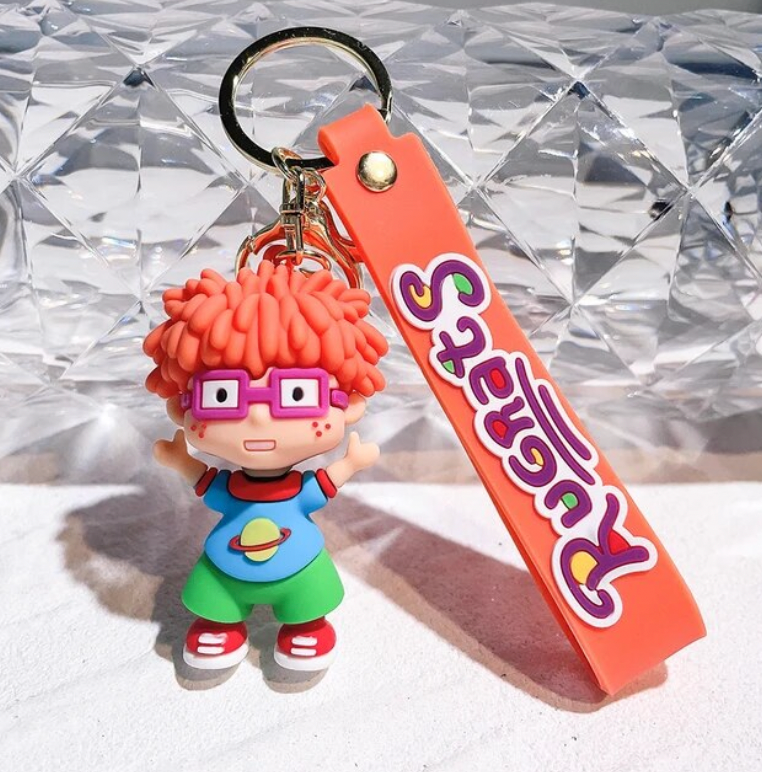 Chuckie Rugrats 3D PVC figure keychain with orange Rugrats branded wrist strap