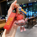 Pink Trolls character keychain with red silicone strap
