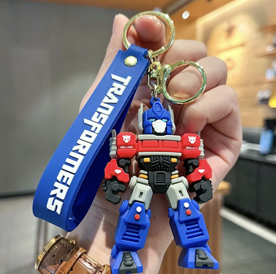 Optimus Prime Transformers 3D PVC figure keychain with blue branded wrist strap