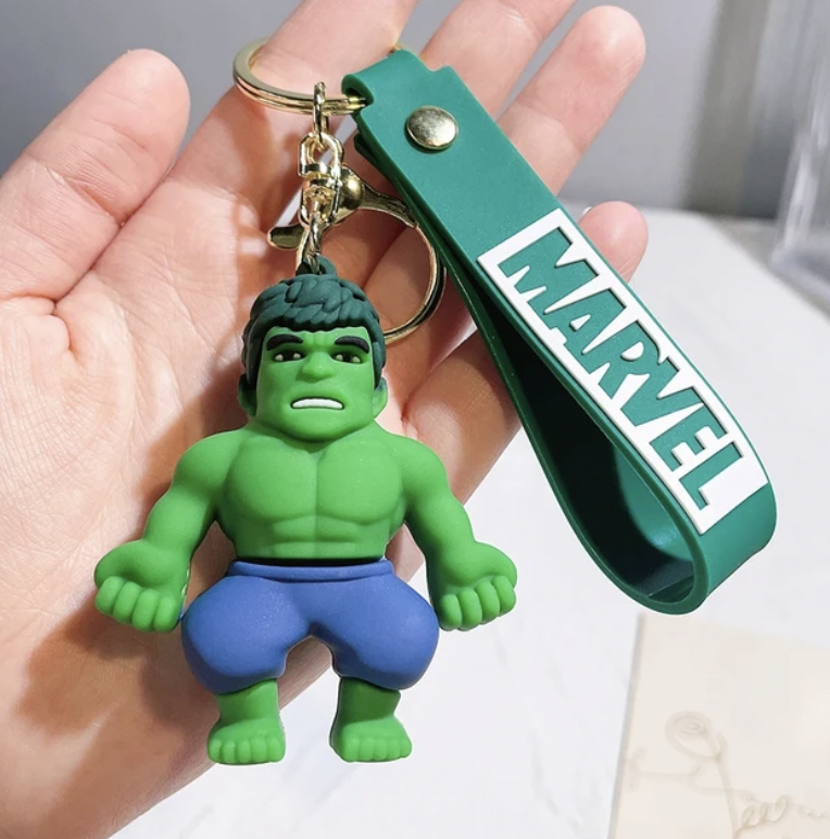 Hulk 3D PVC keychain with green Marvel wrist strap held in hand