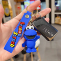 Cookie Monster from Sesame Street 3D rubber keychain with blue Sesame Street wristlet strap and gold-tone lobster clasp