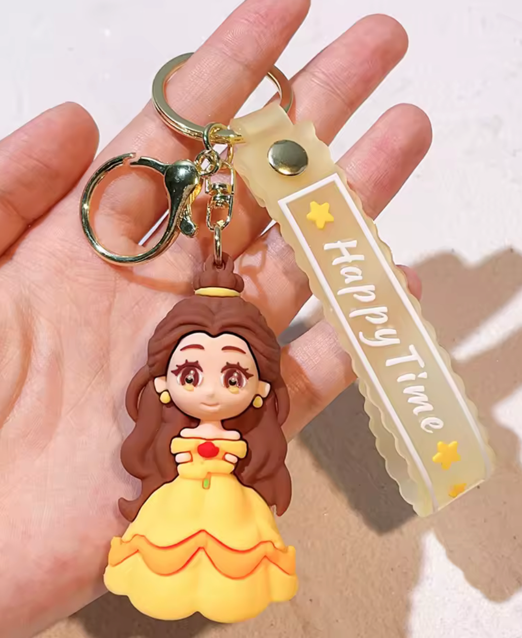 Belle from Disney Beauty and the Beast 3D PVC keychain with gold Happy Time wristlet strap and gold-tone lobster clasp