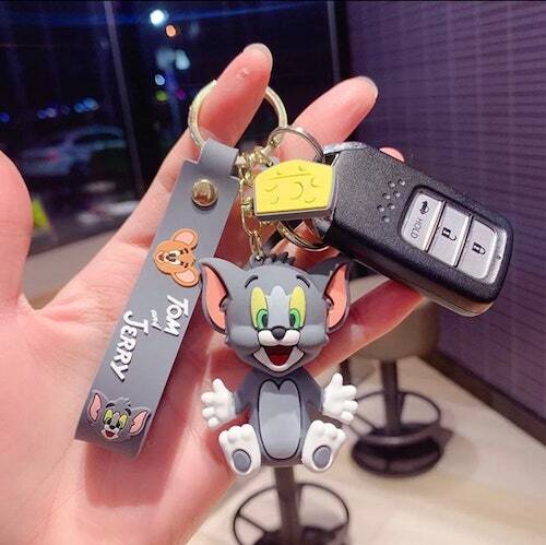 Tom Cat from Tom & Jerry 3D rubber keychain with grey Tom & Jerry wristlet strap, cheese charm and gold-tone lobster clasp